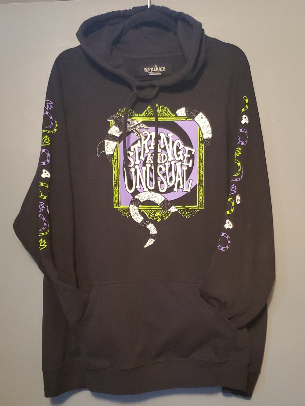 Torrid Black Beetlejuice "Strange and Unusual" Graphic Hoodie with Snake Sleeves
